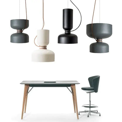 Modern minimalist decorbites led pendant light with matte black and off-white iron fixtures and copper-toned cords for interiors