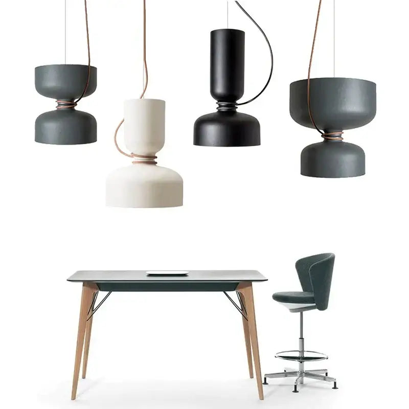 Modern minimalist decorbites led pendant light with matte black and off-white iron fixtures and copper-toned cords for interiors