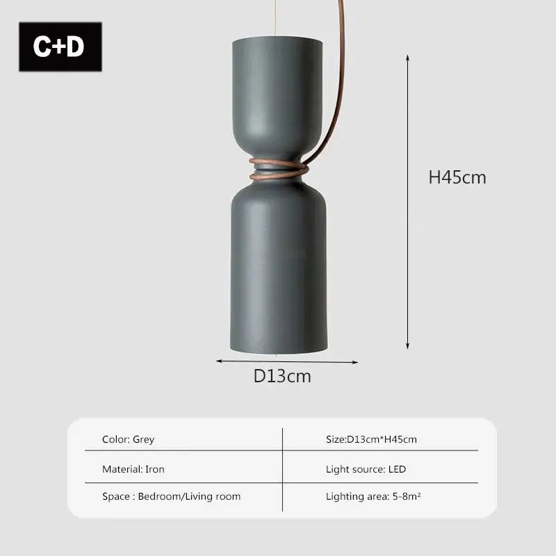 Grey iron DecorBites LED pendant light with sleek two-part cylindrical design and braided cord suspension for modern decor