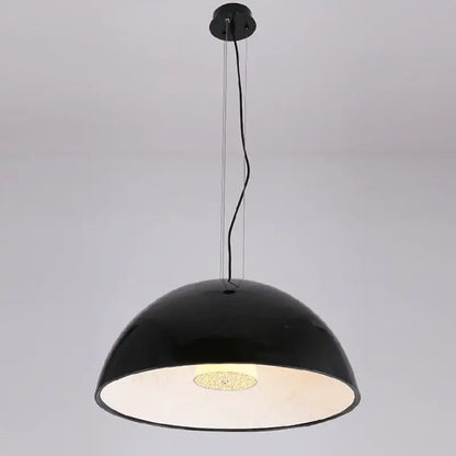 Black dome-shaped DecorBites LED pendant light with glossy finish and illuminated textured bulb for indoor decor