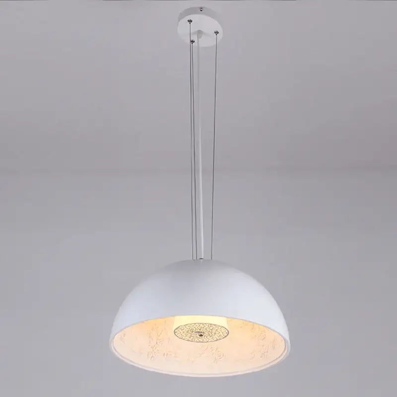 White dome-shaped decorbites led pendant light with frosted glass interior and decorative etching for indoor use