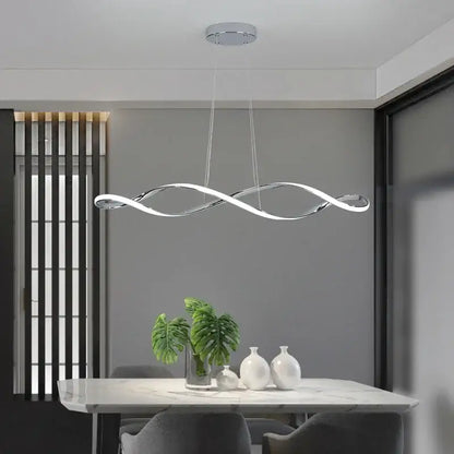 Modern chrome-finished DecorBites LED pendant light with a sleek wave-like design for living dining kitchen bar spaces
