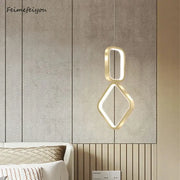 Modern gold-toned geometric decorbites led pendant light with interlocking oval and diamond frames for indoor use