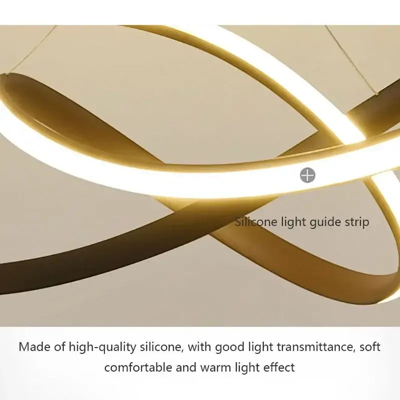 Gold-colored silicone light guide strip with sleek curved design in DecorBites led pendant light for modern decor