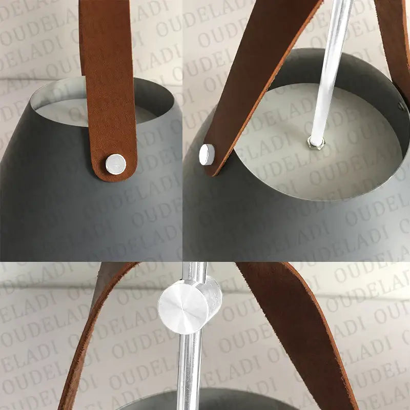 Dark gray metal decorbites led pendant light with brown leather straps and silver hardware for kitchen and living room