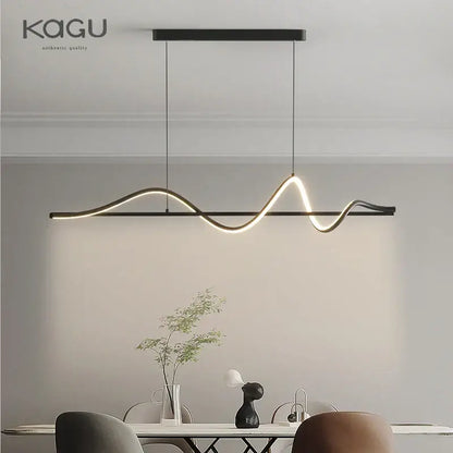 Black Kagu brand modern white and black DecorBites led pendant light with sleek wave-shaped design and warm illumination