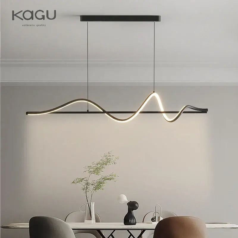 Black Kagu brand modern white and black DecorBites led pendant light with sleek wave-shaped design and warm illumination