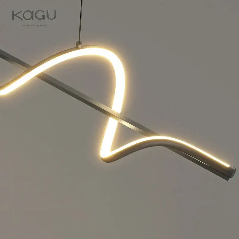 Modern minimalist DecorBites LED pendant light in white and black with sleek curved design and warm white illumination