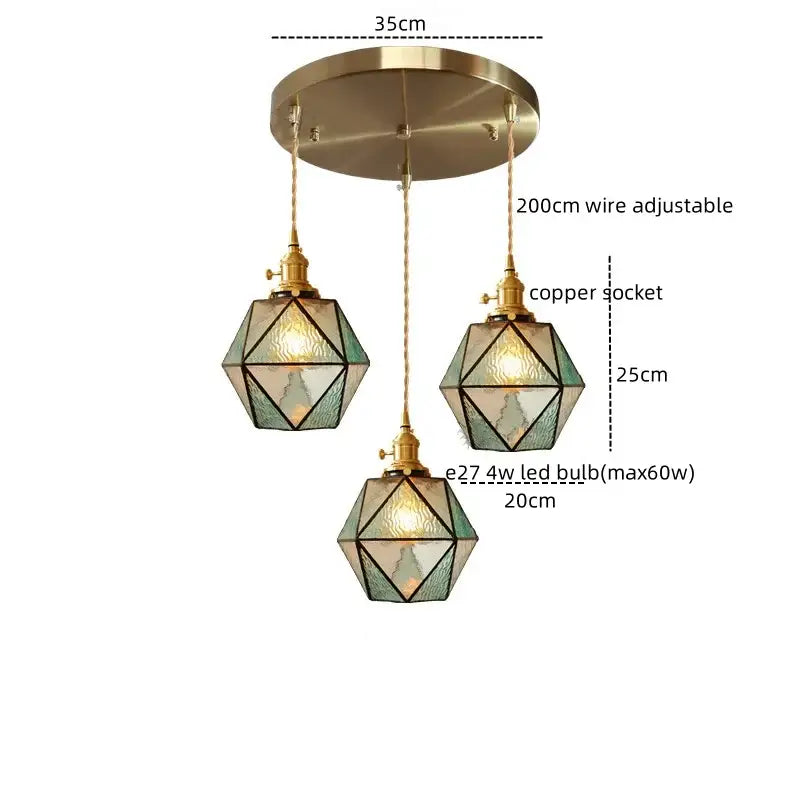 Three geometric glass pendant lights with brass fixtures and adjustable copper wires in decorbites led pendant light design