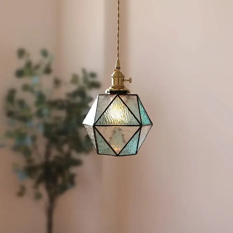 DecorBites led pendant light with geometric teal-tinted glass panels and brass fixture for bedroom and dining room lighting