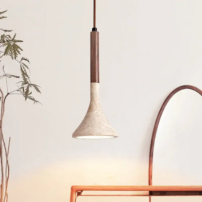 Modern decorbites led pendant light with textured off-white concrete shade and copper stem inspired by yellow travertine