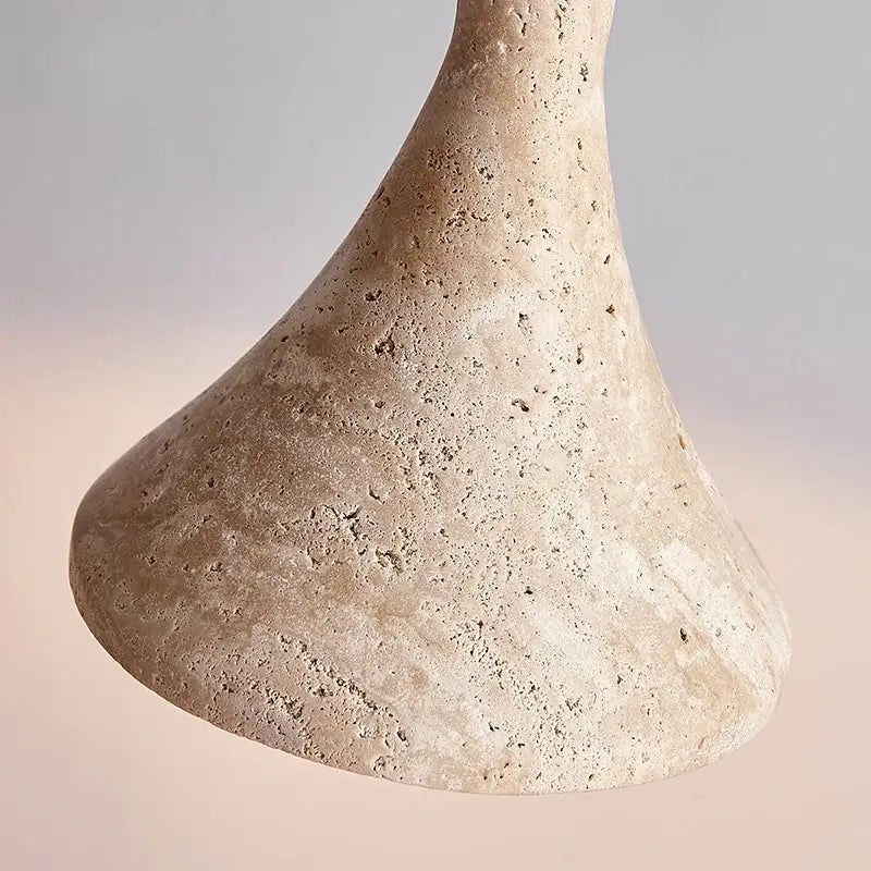 Beige textured stone lampshade of DecorBites LED pendant light in yellow travertine with a tapered conical shape