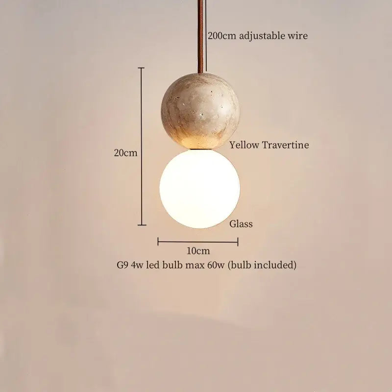 A decorbites led pendant light featuring a modern yellow travertine textured sphere above a smooth white glass globe