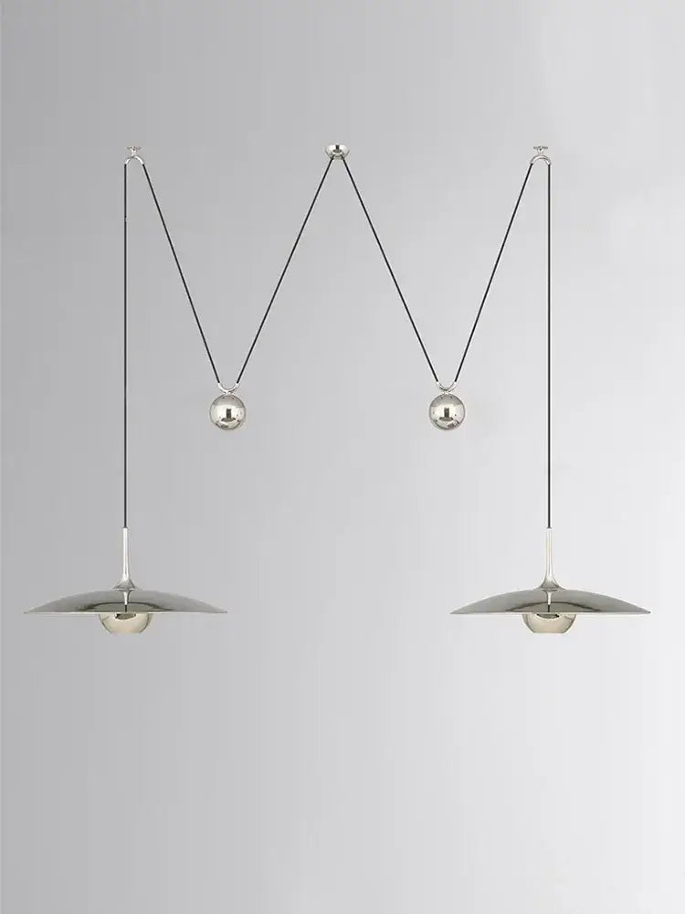 Silver metallic decorbites led pendant lights with circular shades and curved suspension cords for bedroom and dining room
