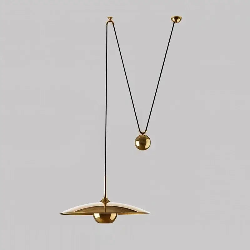 A sleek gold-toned decorbites led pendant lighting lamp with disc-shaped shade and black cords for bedroom or dining room