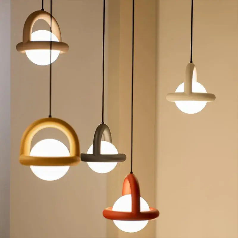 Modern pendant lights with minimalist wood frames in natural, matte white, and terracotta tones by decorbites led pendant
