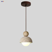 A modern decorbites led pendant light with beige textured concrete finish and warm glow for dining room use