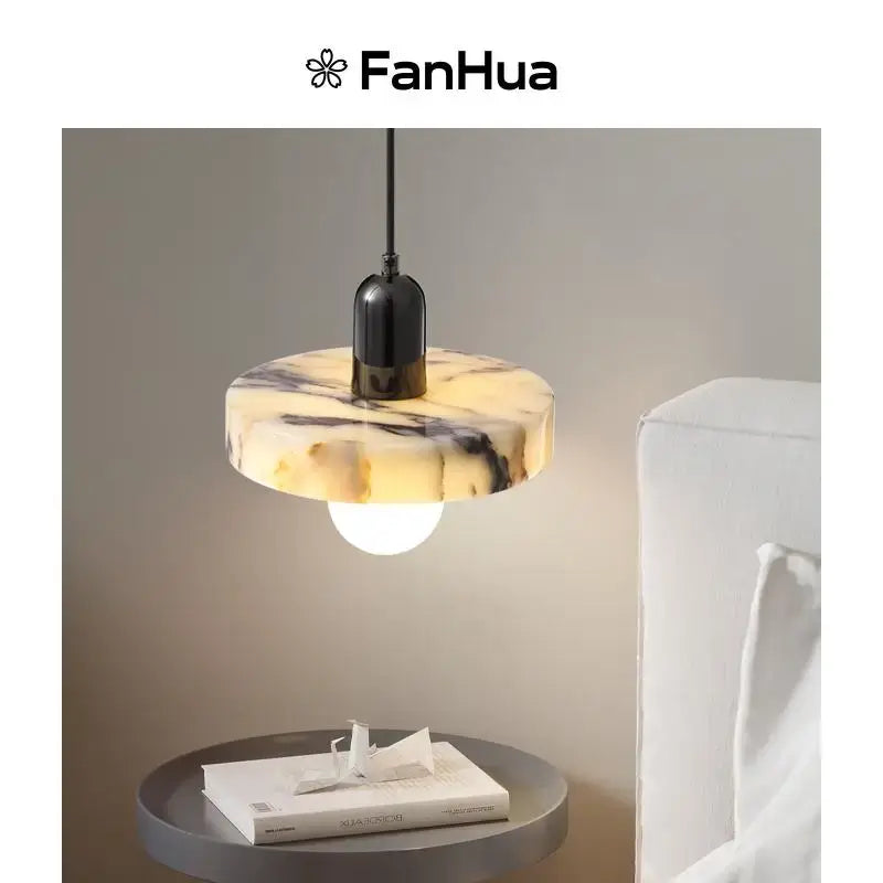 Decorbites led pendant lights bulgari with a circular polished marble shade in creamy yellow and black veining