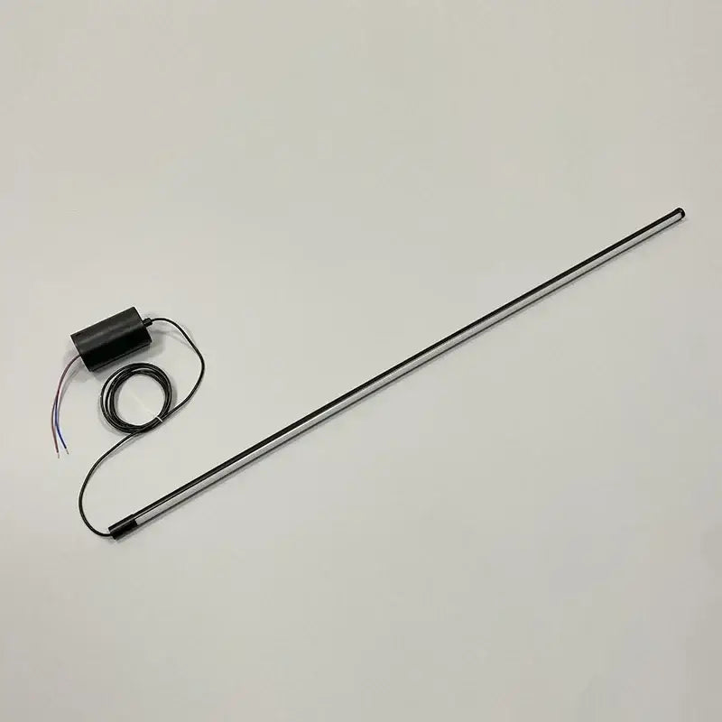 Black cylindrical sensor with wiring and metallic rod for DecorBites led pendant lights in dining room and bedroom decor