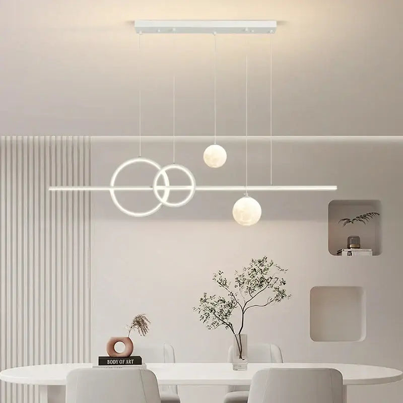 Modern white DecorBites LED pendant lights with circular and spherical elements for dining room and kitchen lighting