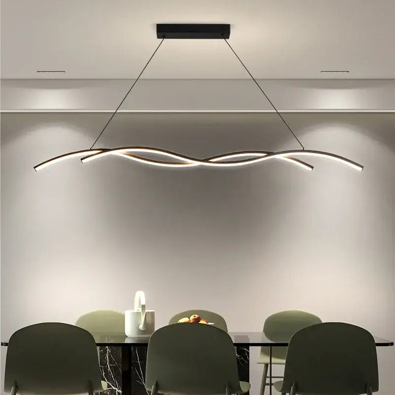 Modern black DecorBites LED pendant lights with sleek wave-like design and warm ambient lighting for indoor decor