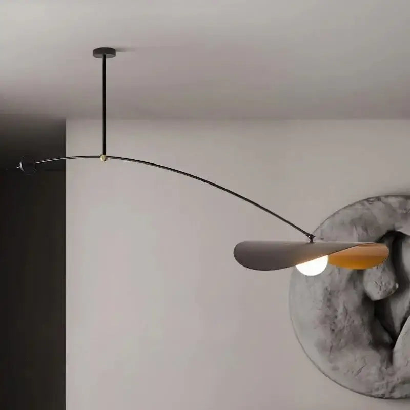 Modern black metal decorbites led pendant lights with sleek curved arm and two-tone gray and amber shade for home decor