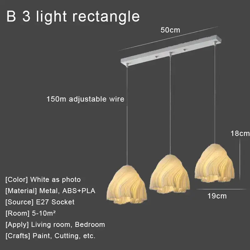 White rectangular DecorBites LED pendant lights with three layered translucent amber lampshades made of ABS and PLA materials