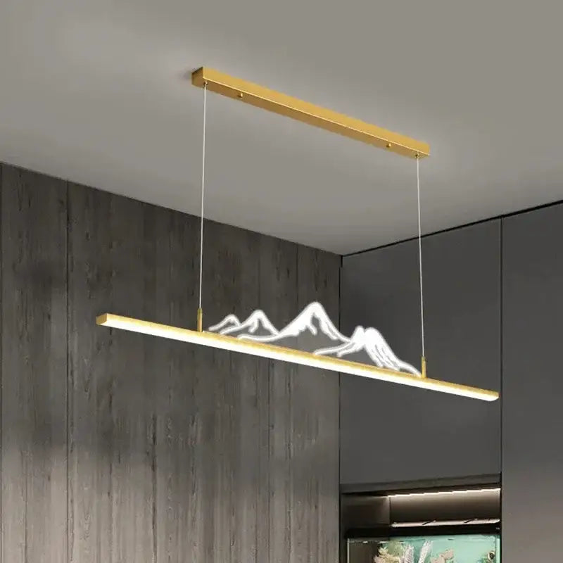 Gold-finished decorbites led pendant linear lights with glowing white mountain silhouette for modern home decor