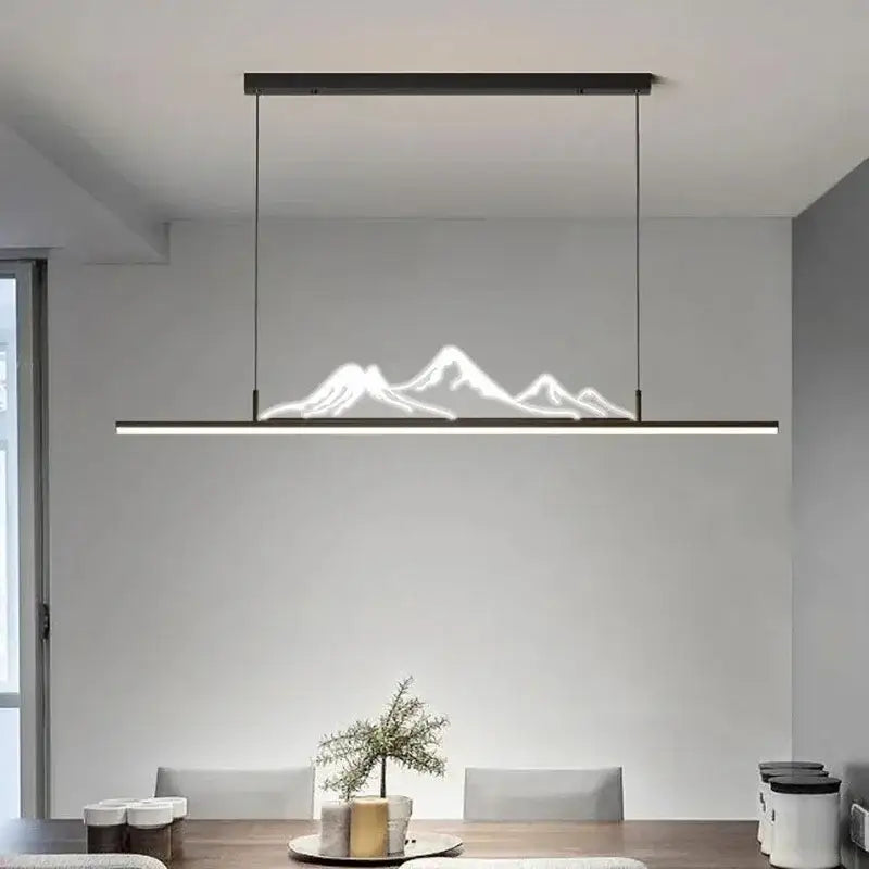 Modern black decorbites led pendant light featuring an illuminated white mountain silhouette for minimalist home decor