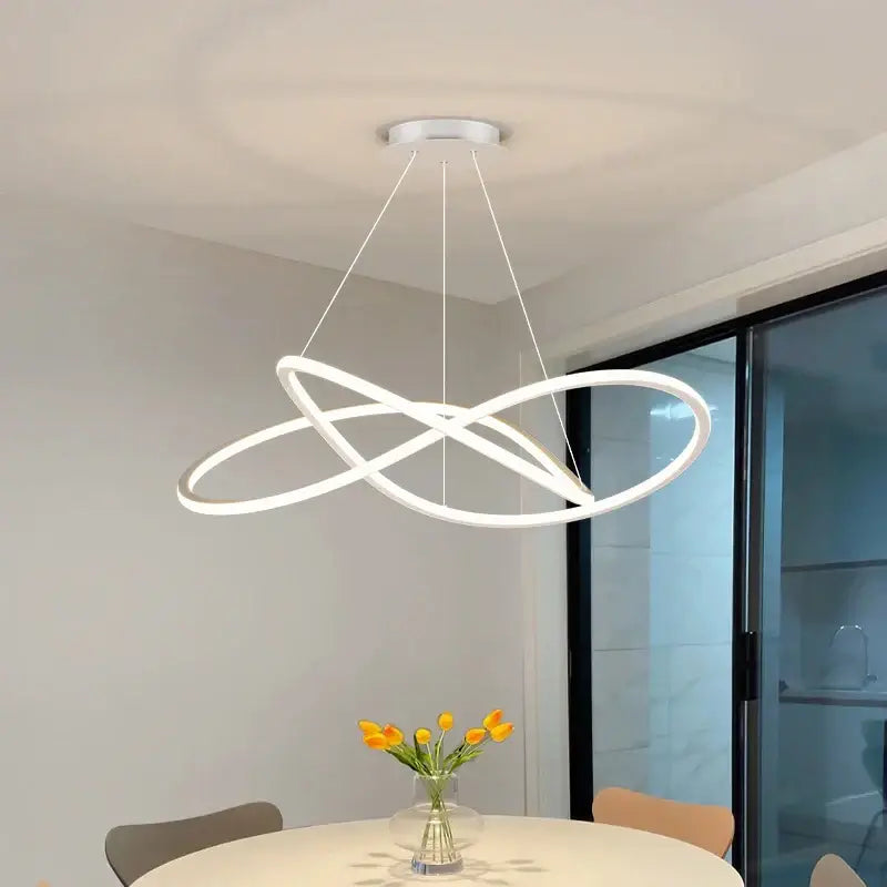 Modern white led pendant lights with intertwined circular rings by decorbites for living dining study room lighting