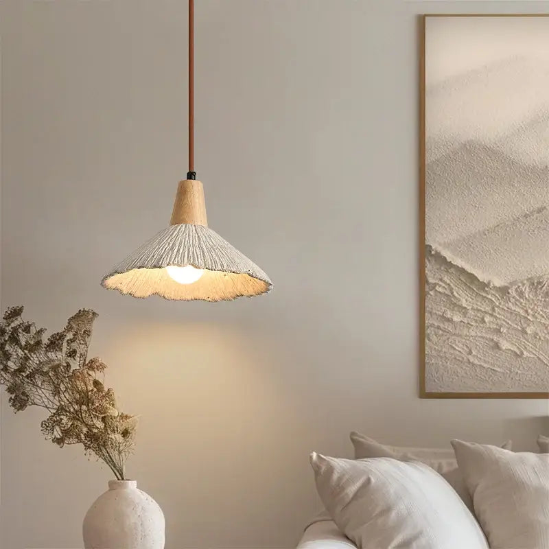 A beige woven decorbites led pendant light with wooden top and copper cord for modern decor use