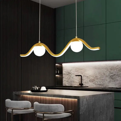 Gold-toned wave-shaped pendant light with two white bulbs from DecorBites led pendant lights for modern indoor decor
