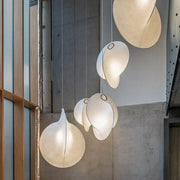 Delicate cream-colored decorbites led pendant lights with organic teardrop shapes for modern living spaces