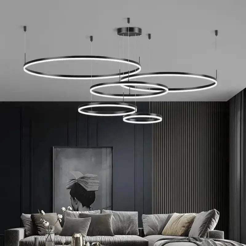 Modern black circular led pendant lights with glowing white rings from DecorBites led pendant for kitchen decor