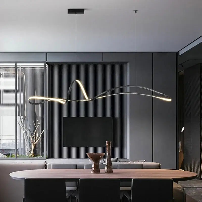 Modern black and gold decorbites led pendant lights with sleek flowing design for living and dining room chandeliers