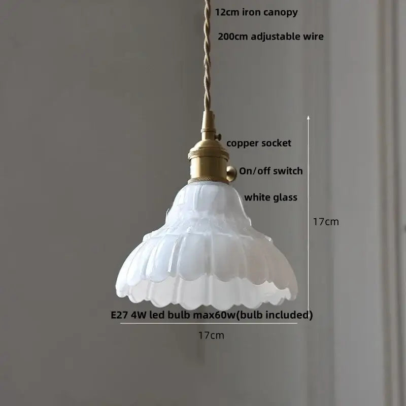 A delicate white glass decorbites led pendant lamp with fluted scalloped design and brass copper socket