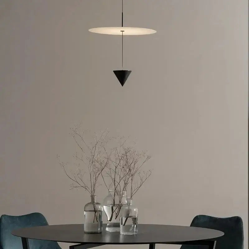 Minimalist decorbites led pendant light with frosted white circular shade and black triangular base for modern home decor