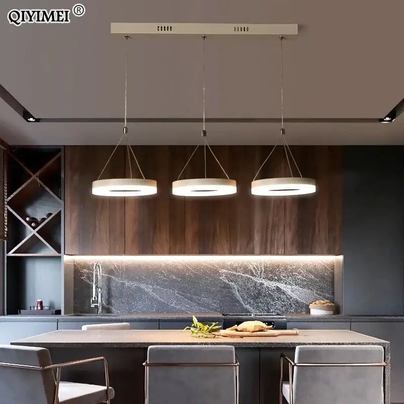 Modern minimalist decorbites led pendant lights with three circular illuminated black and white acrylic shades