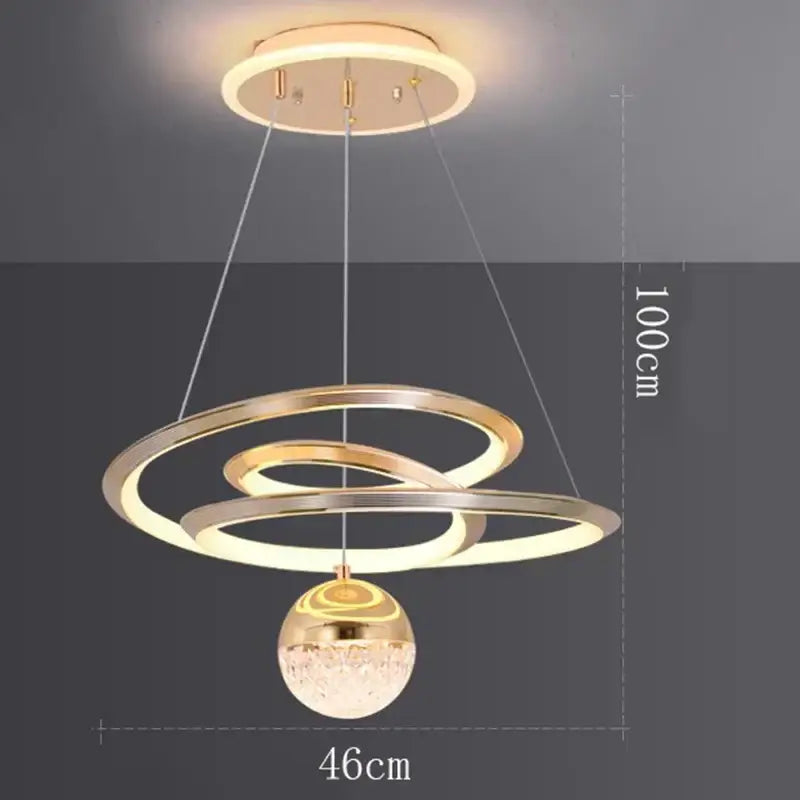 Modern gold-toned DecorBites led pendant lights featuring concentric rings and a crystal spherical pendant for living room decor