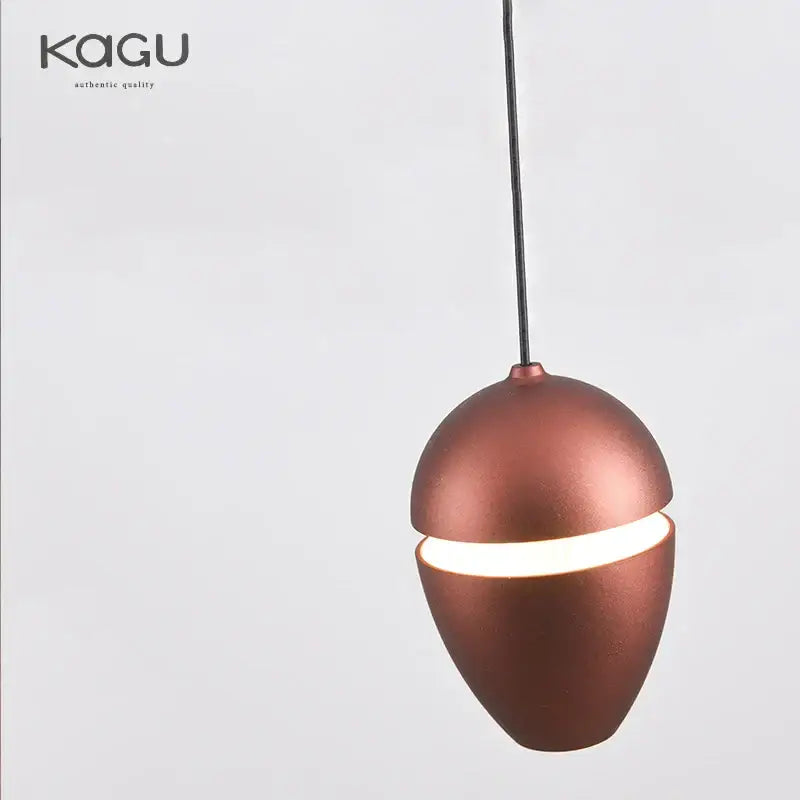 Copper-finished decorbites led pendant lights with sleek egg-shaped design and illuminated band for modern interiors