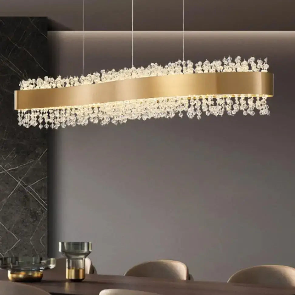 Gold-toned decorbites led pendant lights featuring clear crystal droplets for modern bedroom and hotel decor