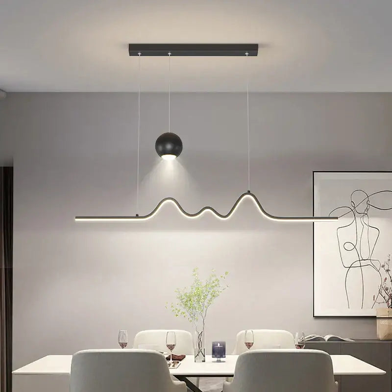 Modern black decorbites led pendant light with sleek wave-shaped led strip and spherical globe for dining kitchen island