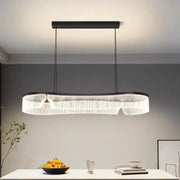 Modern oval pendant lights with black metal frame and clear crystal strands by DecorBites LED pendant lights for indoor use