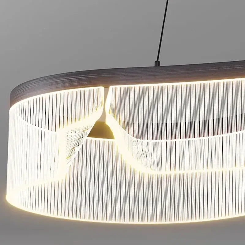 Modern oval pendant lights with dark wood frame and cascading white led strands by DecorBites led pendant