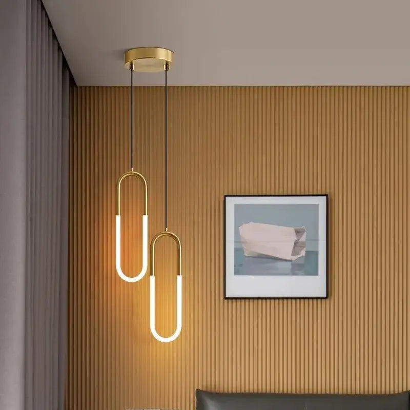 Gold-toned decorbites led pendant lights with u-shaped illuminated white led strips for bedroom and living room lighting