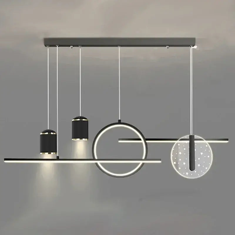 Modern black and white decorbites led pendant lights with geometric cylindrical shades and star-patterned diffusers for home use