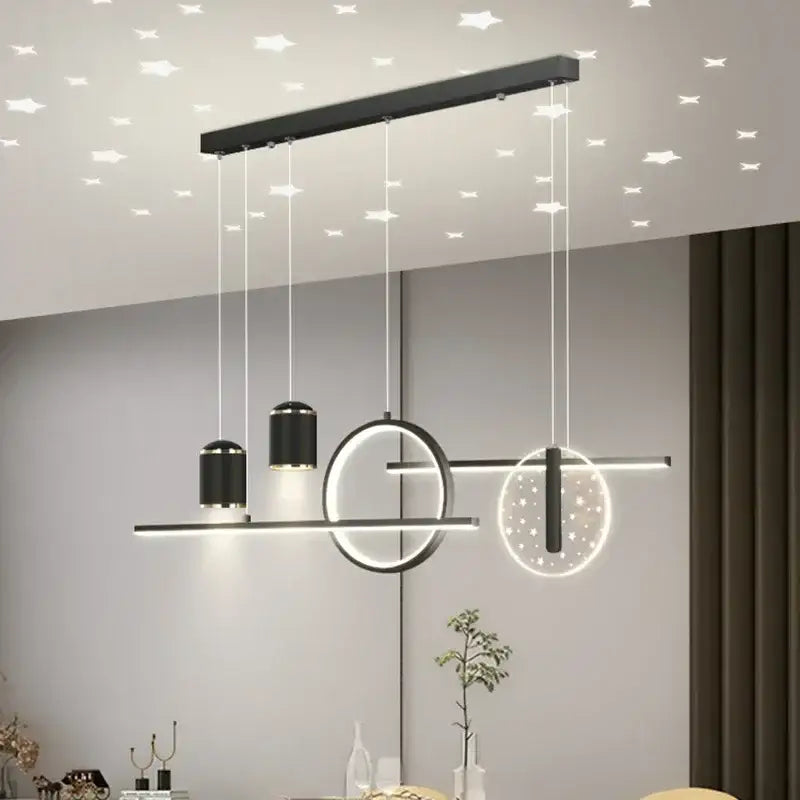 Modern black minimalist decorbites led pendant lights with geometric circular and cylindrical elements for home living spaces