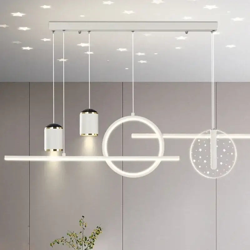 Modern white decorbites led pendant lights with geometric circular and gold-accented cylindrical shades for home living spaces