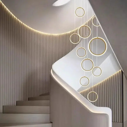A decorbites led pendant featuring modern simplicity with glowing gold circular rings for living room or dining area lighting