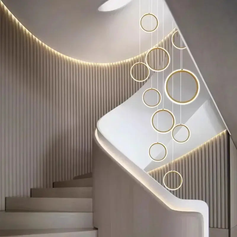 A decorbites led pendant featuring modern simplicity with glowing gold circular rings for living room or dining area lighting